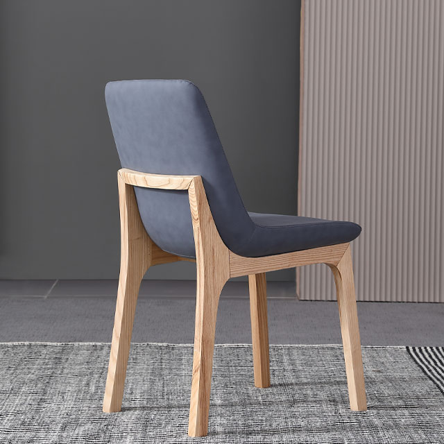 Sedia da pranzo moderna in velluto blu con gambe in legno